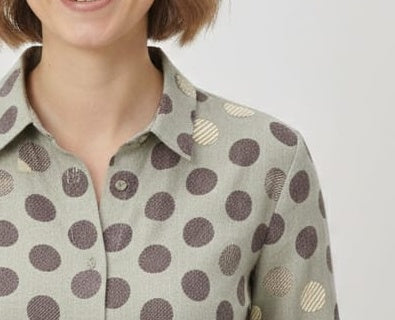 Close-up of LOMEE grey-beige 20s cotton sheeting with brown polka dots and pale-yellow striped dots